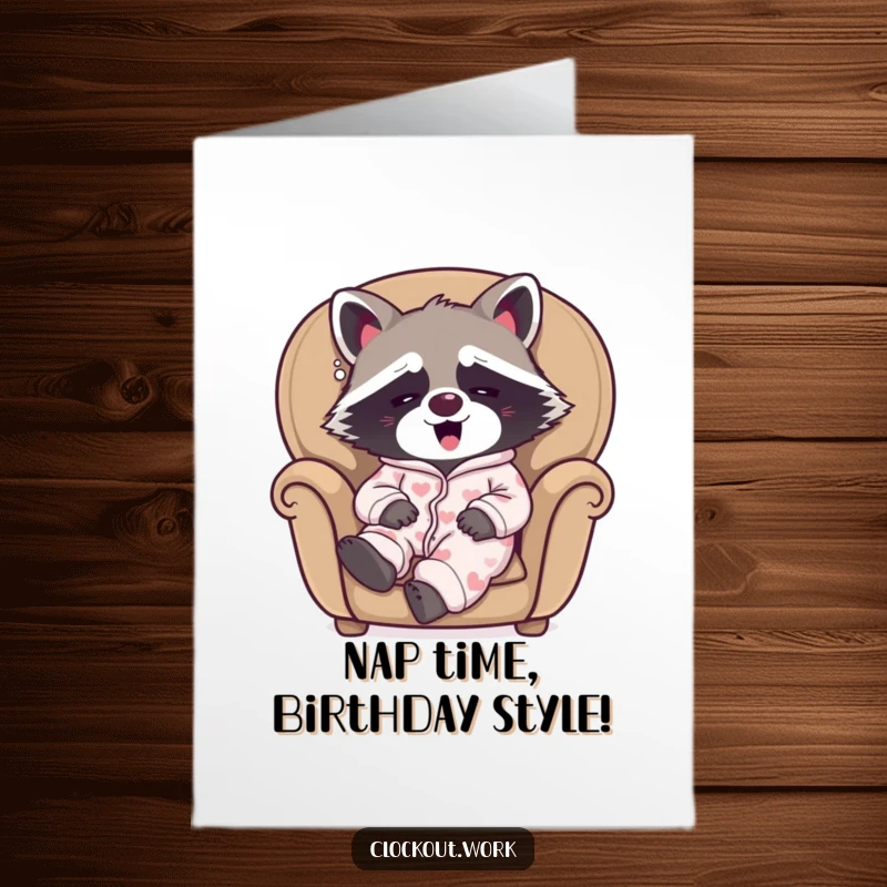 Funny free printable birthday card of a sleepy raccoon in pajamas yawning happily in a cozy armchair, spreading relaxation.